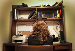 Joey Flechas / Alligator File Photo An undocumented student sits at her desk with her headphones on. She has been in the country for 10 years and hopes to get a chance to earn citizenship if the DREAM Act passes. November 18, 2010. 